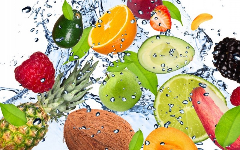 Picture of fruits falling into the water