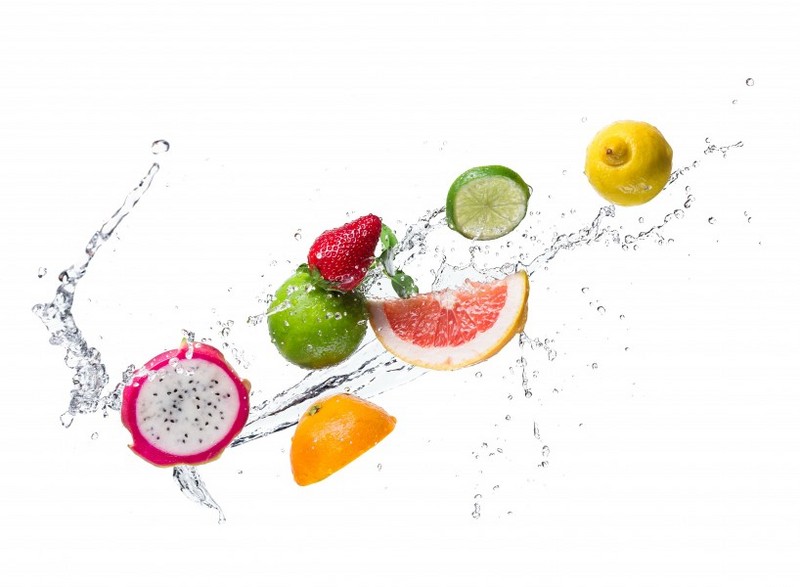 Picture of fruits falling into the water