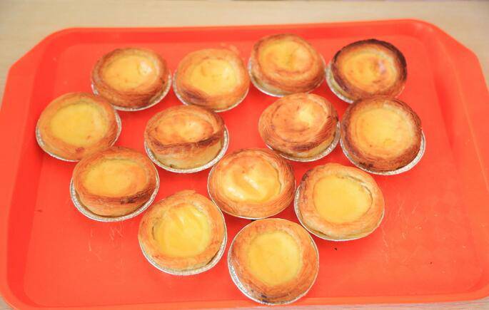 Picture of freshly baked Macau Portuguese egg tarts