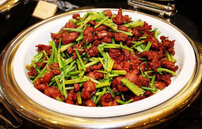 Picture of stir fried pork with celery as a home cooked dish