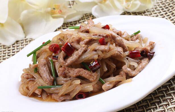 A delicious home cooked dish with shredded radish and stir fried meat picture