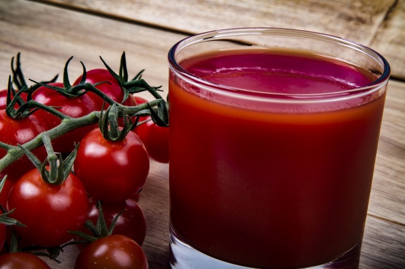 Fresh organic tomatoes and tomato juice pictures