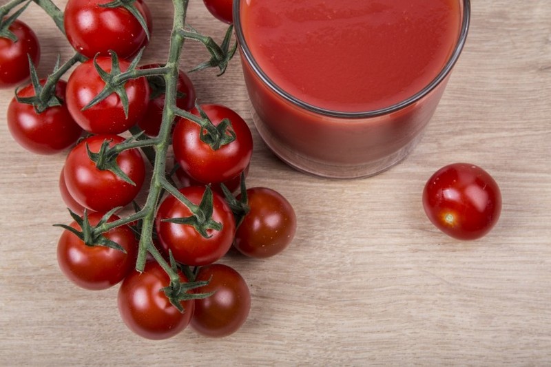 Fresh organic tomatoes and tomato juice pictures