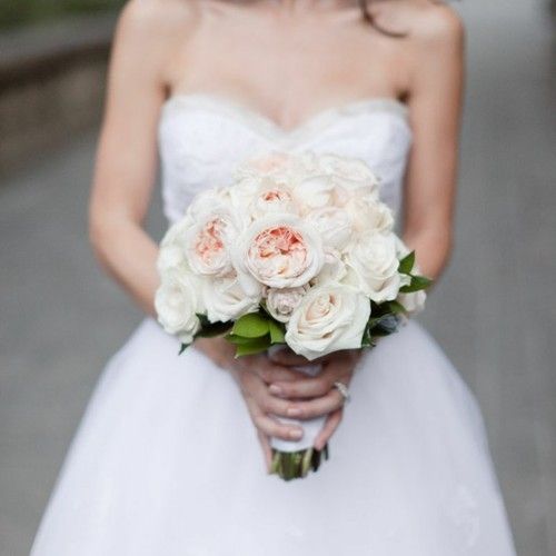 Bride carrying flowers