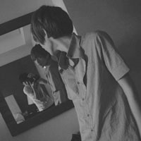 A collection of black and white pictures and avatars of non-mainstream boys