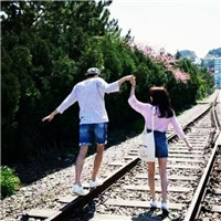 Hold the child's hand and lead the child away. Romantic portrait of couple holding hands.