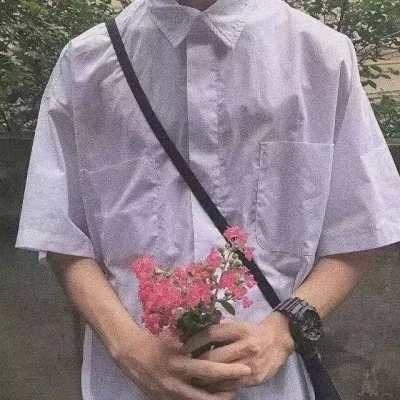 High-definition literary and artistic half-length picture of a man's head holding a flower