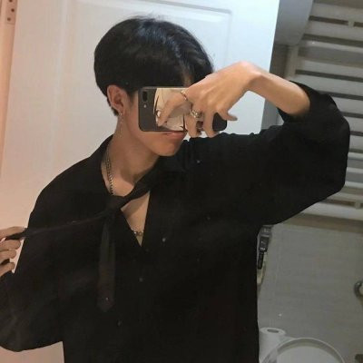 Boy's avatar picture with mobile phone covering his face