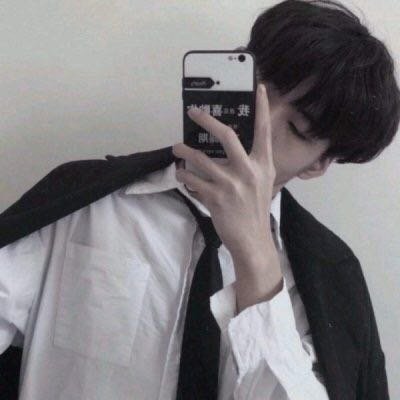 Boy's avatar picture with mobile phone covering his face