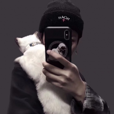 High Definition avatar picture of a handsome boy holding a cat in his arms