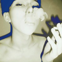 Picture of a decadent boy spitting smoke avatar