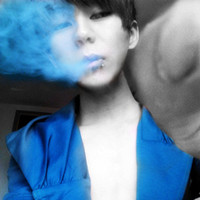 Picture of a decadent boy spitting smoke avatar