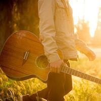 A more literary avatar picture of a boy playing guitar