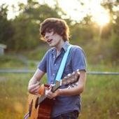 A more literary avatar picture of a boy playing guitar