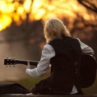 A more literary avatar picture of a boy playing guitar