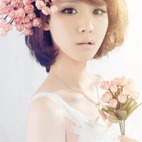 Fresh avatar picture of a girl wearing flowers on her head