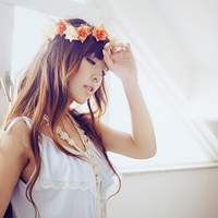 Fresh avatar picture of a girl wearing flowers on her head