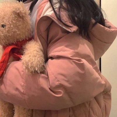 HD headshot picture of a girl hugging a bear without showing her face