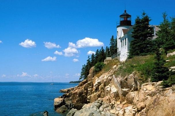 Beautiful scenery pictures of lighthouse guarding ships