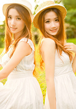 Beautiful photos of two beautiful girls in the pure and sunny outdoors